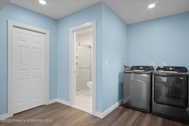 316 Sibley Ave, Old Forge, PA 18518 - laundry area with independent washer and dryer, dark wood-type flooring, baseboards, and recessed lighting