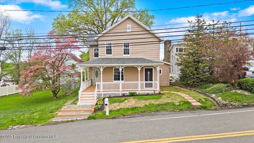 316 Sibley Ave, Old Forge, PA 18518 - view of front of property featuring covered porch, a front lawn, a shingled roof, and stairway