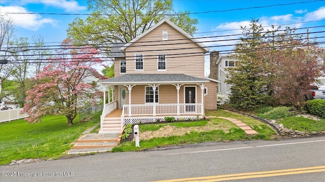316 Sibley Ave, Old Forge, PA 18518 - view of front of property featuring covered porch, a front lawn, a shingled roof, and stairway