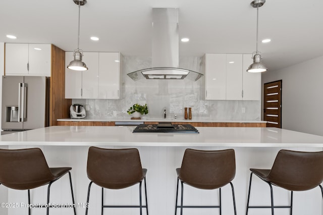 203 Red Oak Dr, Olyphant, PA 18447 - kitchen featuring stainless steel fridge with ice dispenser, white cabinets, and island exhaust hood