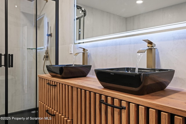 203 Red Oak Dr, Olyphant, PA 18447 - full bath featuring a shower stall, double vanity, and a sink