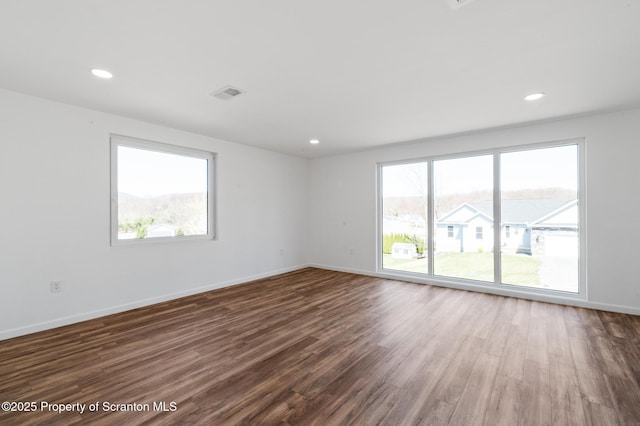 203 Red Oak Dr, Olyphant, PA 18447 - unfurnished room with visible vents, baseboards, recessed lighting, and dark wood-style floors