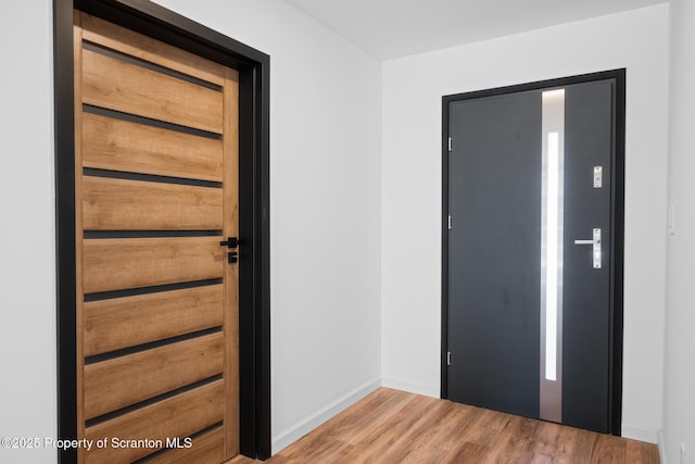 203 Red Oak Dr, Olyphant, PA 18447 - foyer with a sauna, baseboards, and wood finished floors