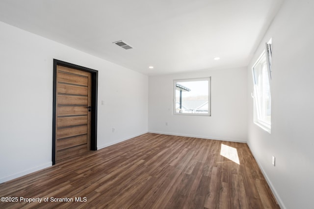 203 Red Oak Dr, Olyphant, PA 18447 - spare room featuring recessed lighting, dark wood-type flooring, visible vents, and baseboards
