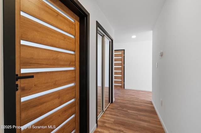 203 Red Oak Dr, Olyphant, PA 18447 - hallway with wood finished floors, baseboards, and recessed lighting