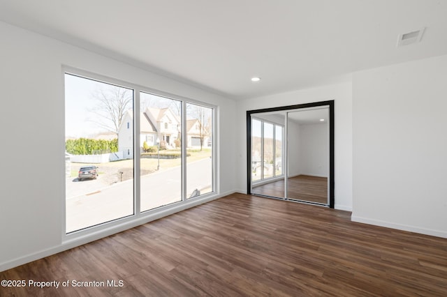 203 Red Oak Dr, Olyphant, PA 18447 - interior space featuring recessed lighting, dark wood-type flooring, visible vents, and baseboards