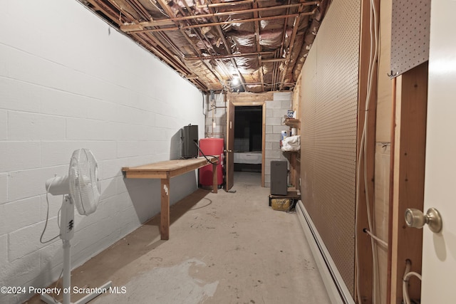 basement with a baseboard heating unit