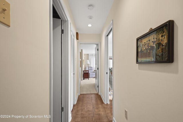 corridor with dark parquet floors