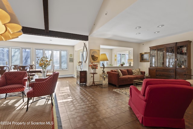 living room with lofted ceiling and baseboard heating