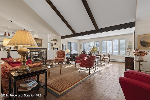 living room with high vaulted ceiling and beamed ceiling