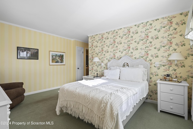 bedroom with dark carpet and crown molding