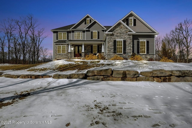 view of front of home with stone siding