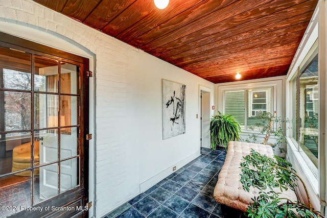 entrance to property featuring a porch