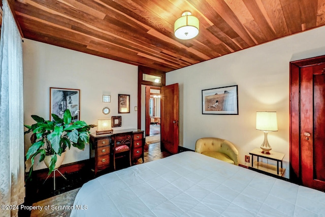 bedroom featuring wooden ceiling