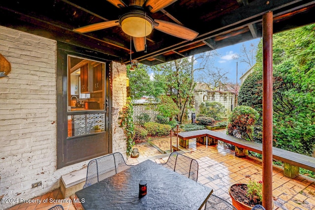 view of patio / terrace featuring ceiling fan