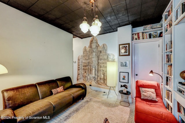 living room with an inviting chandelier