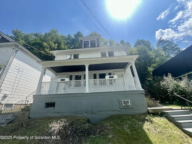 133-135 Newport St, Glen Lyon, PA 18617 - back of property featuring stairway and covered porch