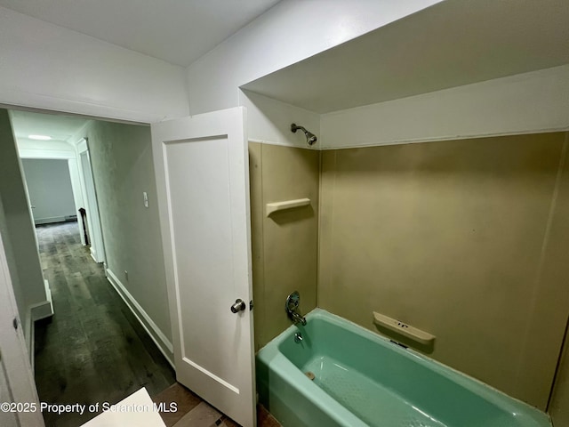 133-135 Newport St, Glen Lyon, PA 18617 - bathroom featuring  shower combination and wood finished floors