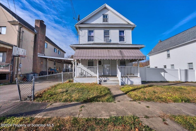 view of property with covered porch