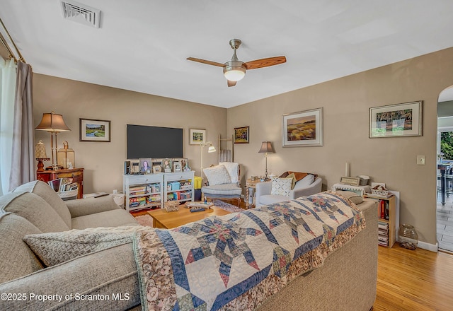 1017 Willow St Unit L14-15, Scranton, PA 18505 - living room with ceiling fan, wood finished floors, and arched walkways