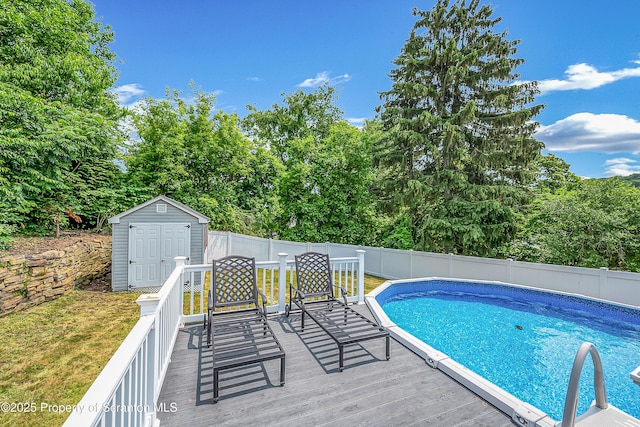 1017 Willow St Unit L14-15, Scranton, PA 18505 - view of swimming pool with a fenced backyard, a storage unit, and a deck