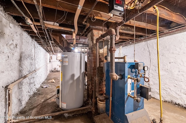 utility room featuring gas water heater