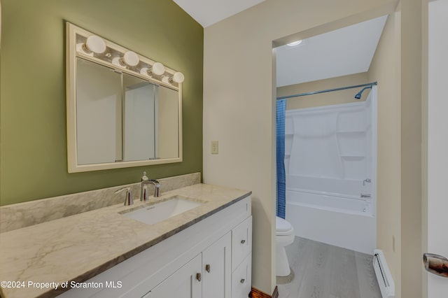 full bathroom featuring a baseboard radiator, toilet, shower / tub combo with curtain, vanity, and hardwood / wood-style flooring