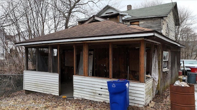 exterior space with a sunroom