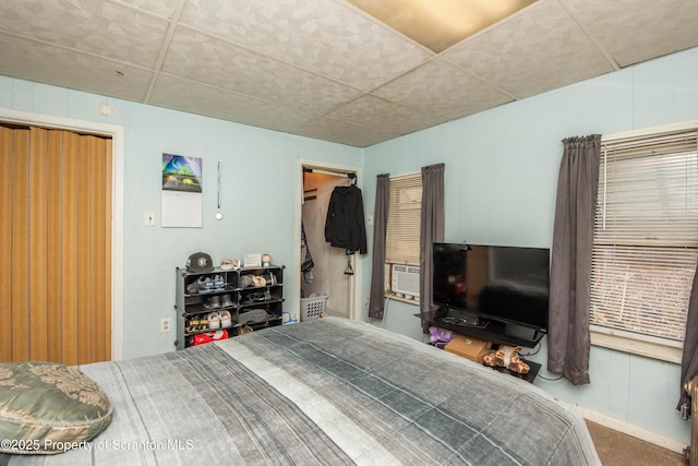 bedroom featuring a drop ceiling