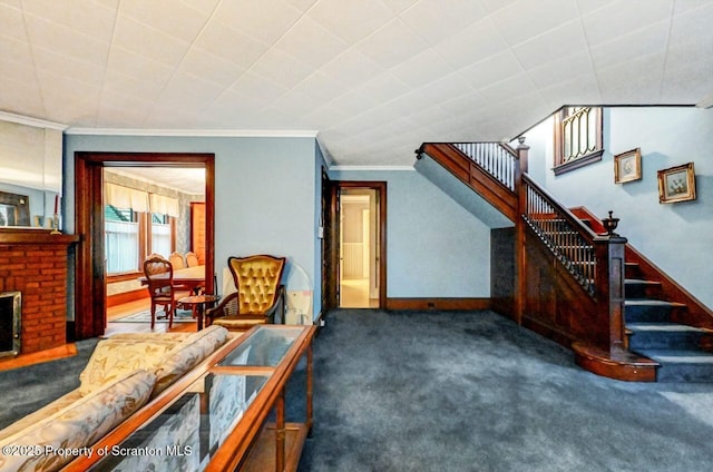 interior space with a brick fireplace, crown molding, and dark colored carpet