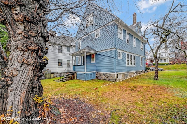 view of property exterior featuring a yard