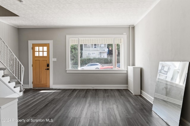 entrance foyer featuring dark hardwood / wood-style floors