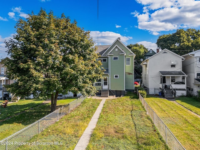 view of front of property with a front lawn