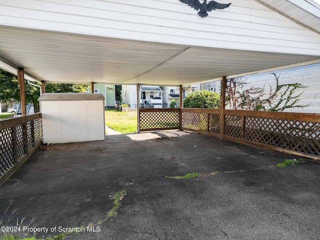 view of patio featuring a shed