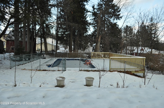 view of snow covered pool