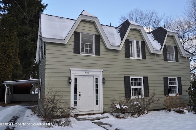 view of front of house featuring a carport