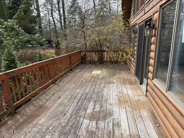 166 Tanglewod Dr, Greentown, PA 18426 - wooden deck with view of wooded area