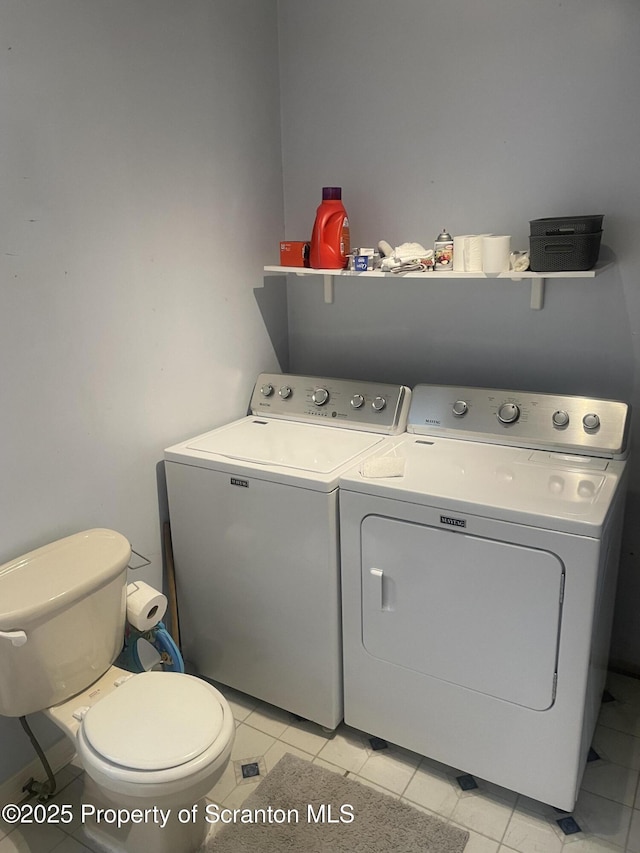 841 Hill St, Archbald, PA 18403 - washroom featuring washer and clothes dryer and light tile patterned floors