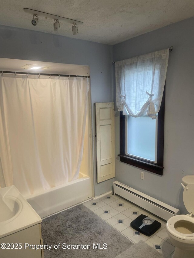 841 Hill St, Archbald, PA 18403 - full bath featuring a baseboard radiator, toilet, tile patterned flooring, vanity, and shower / tub combo