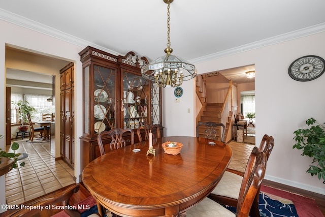 1200 Merion Cir, Clarks Summit, PA 18411 - dining area featuring stairway, a chandelier, ornamental molding, and tile patterned flooring