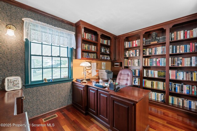 1200 Merion Cir, Clarks Summit, PA 18411 - home office with wallpapered walls, dark wood-style floors, and wall of books
