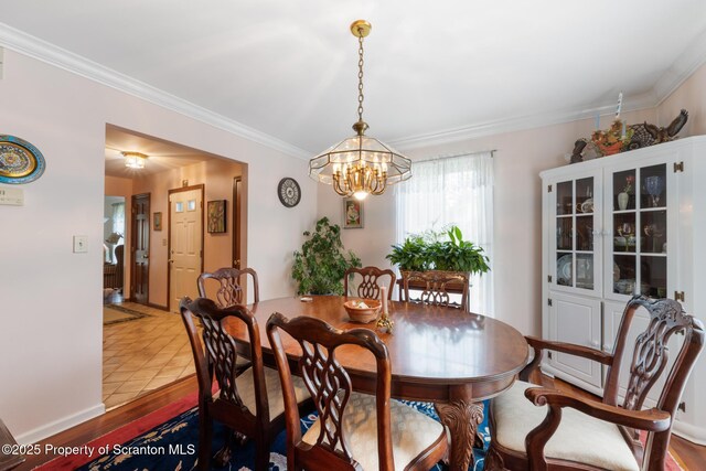 1200 Merion Cir, Clarks Summit, PA 18411 - dining room featuring a chandelier, ornamental molding, and wood finished floors