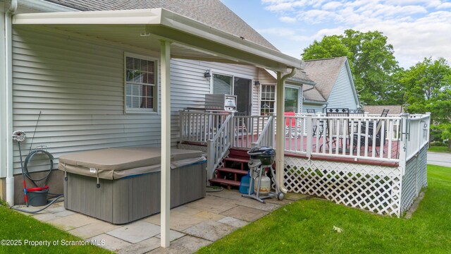 1200 Merion Cir, Clarks Summit, PA 18411 - wooden deck with a hot tub, a patio, and a yard