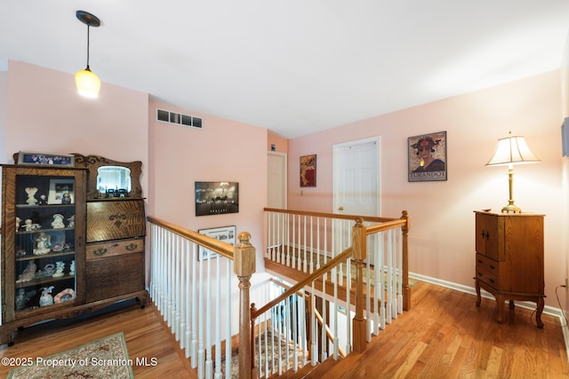 1200 Merion Cir, Clarks Summit, PA 18411 - hallway featuring an upstairs landing and wood finished floors