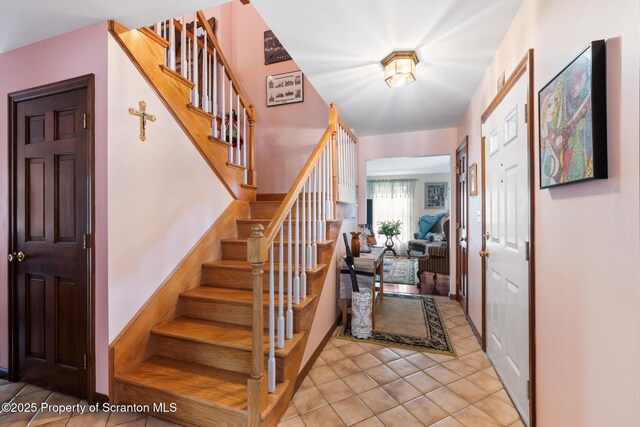 1200 Merion Cir, Clarks Summit, PA 18411 - foyer featuring stairway and light tile patterned flooring