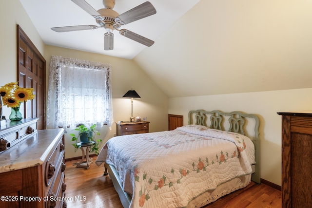 1200 Merion Cir, Clarks Summit, PA 18411 - bedroom with lofted ceiling, wood finished floors, and ceiling fan