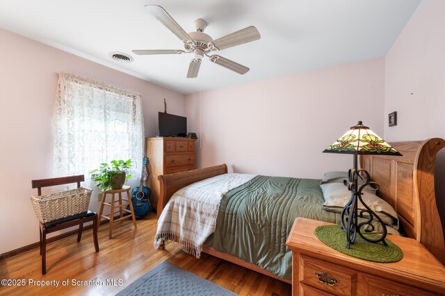 1200 Merion Cir, Clarks Summit, PA 18411 - bedroom featuring wood finished floors and a ceiling fan