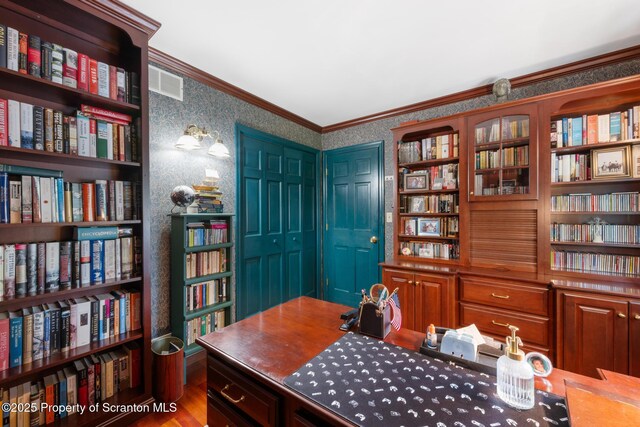 1200 Merion Cir, Clarks Summit, PA 18411 - office area with ornamental molding, wood finished floors, bookshelves, and wallpapered walls