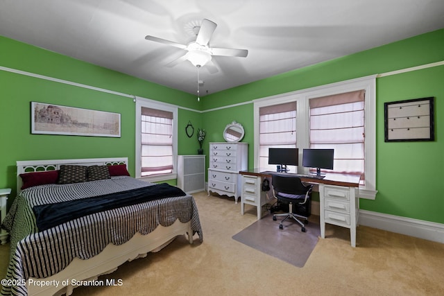 1012 Sunset St, Scranton, PA 18509 - carpeted bedroom with a desk and a ceiling fan