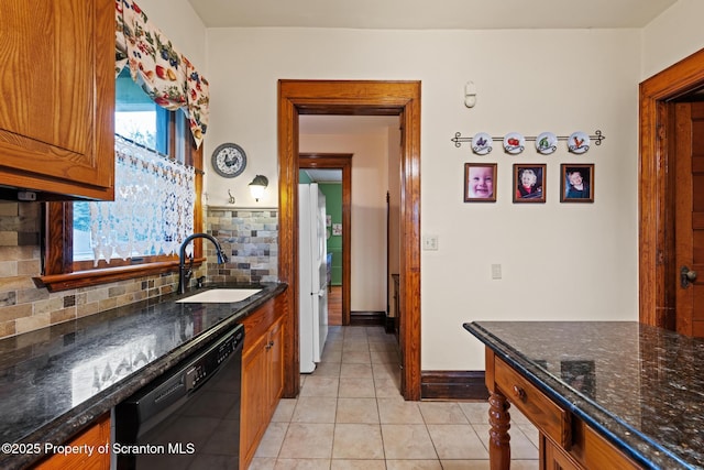 1012 Sunset St, Scranton, PA 18509 - kitchen with dishwasher, brown cabinets, tasteful backsplash, and light tile patterned floors